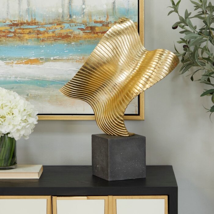 The Novogratz Gold Polystone Wave Abstract Sculpture with Black Base