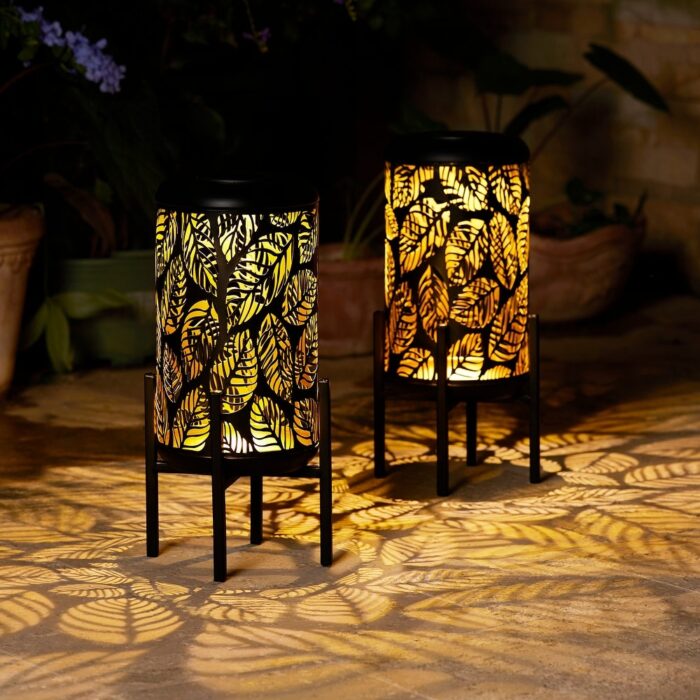 Glitzhome 14.25"H Set of 2 Metal Flower Cutout Solar Lanterns Floor Lamp