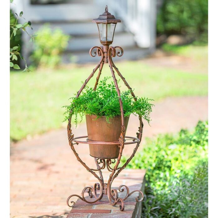 Antiqued Wrought Iron Plant Stand with Solar Light - Image 2